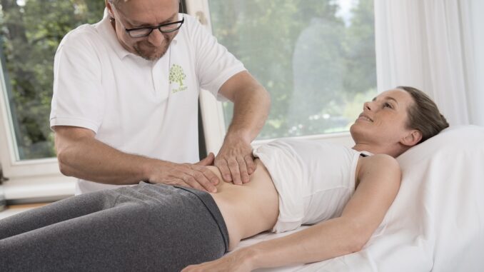 138-press-picture-woman-mayr-abdominal-massage-at-medical-spa-resort-park-igls